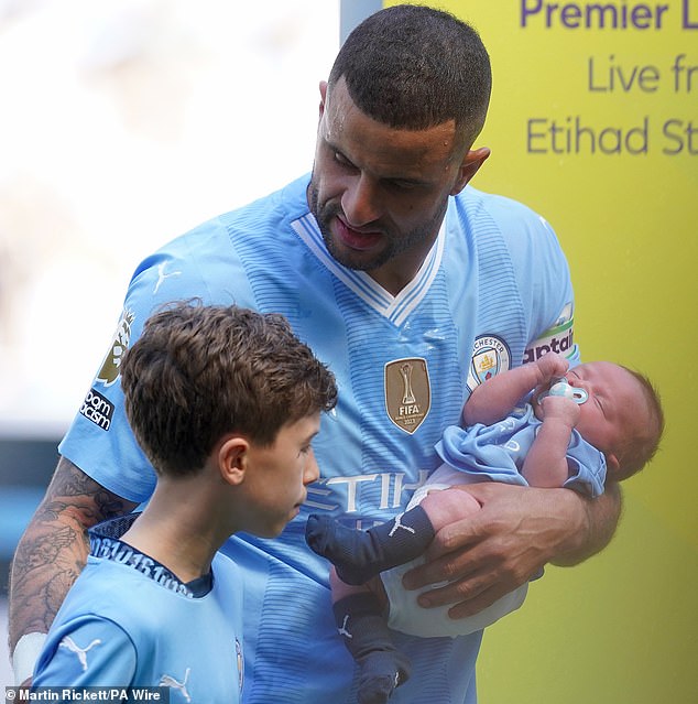 Kyle Walker and Baby Razon before a Premier League match at the Etihad Stadium on May 19