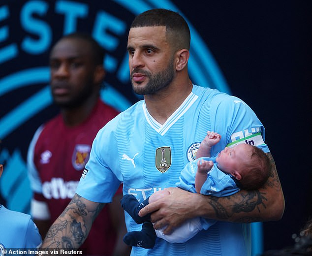 Kyle Walker with his child before the match on May 19 this year