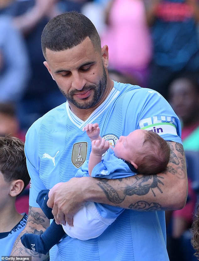 The child was dressed in a head-to-toe Man City kit in tribute to his father