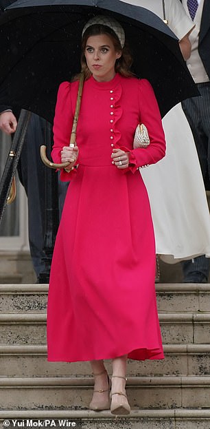 Princess Beatrice brought some much-needed cheer to a drizzling afternoon in her red 'Christina' dress