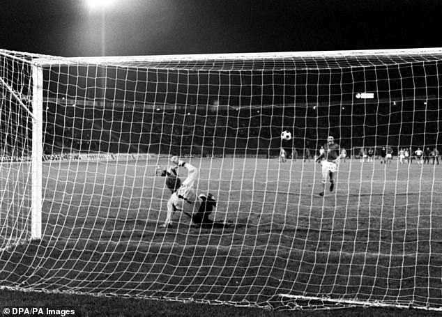 Antonin Panenka scores his famous penalty, helping Czechoslovakia beat West Germany in the 1976 final