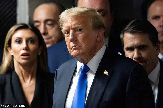 Trump (center) pleaded guilty on Thursday in Manhattan court to 34 counts of falsifying business records.