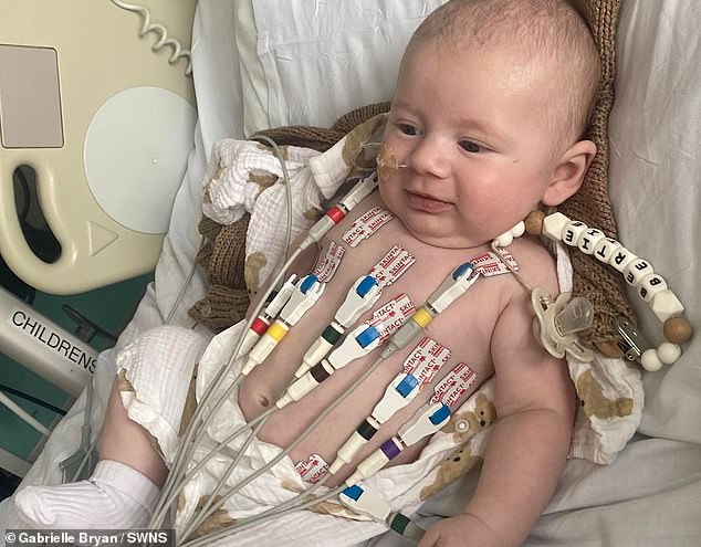 Couple took their six-day-old newborn to A&E for cold sore… and doctors discovered a life-threatening a hole in his heart: ‘We thought we were going to lose him’
