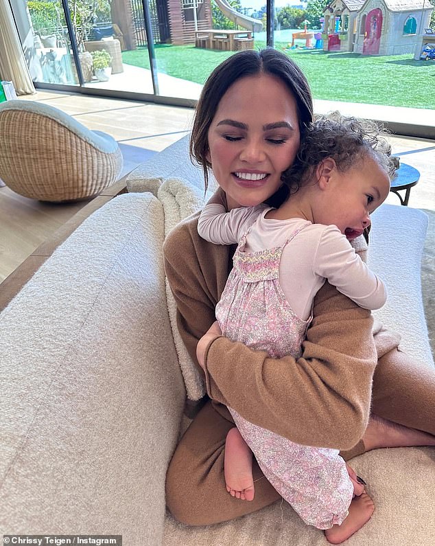Chrissy Teigen, 38, shares heartwarming snaps enjoying fun in the sun with her kids… after getting candid about ‘dark’ times in her life