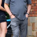Alec Baldwin, 66, looks in high spirits during errand run with wife Hilaria, 40, in NYC – as it’s confirmed he WILL go to trial for fatal Rust shooting