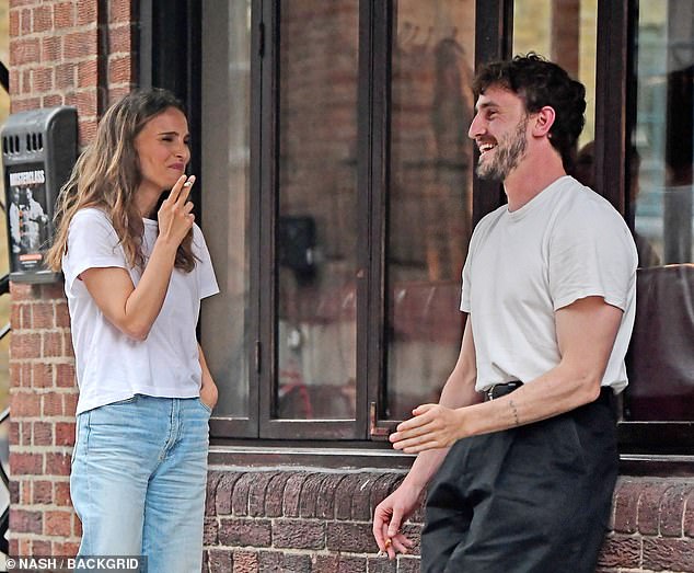 Paul and Natalie couldn't stop laughing as they drank at Bar 69 in Islington last month, although sources have insisted they are just friends