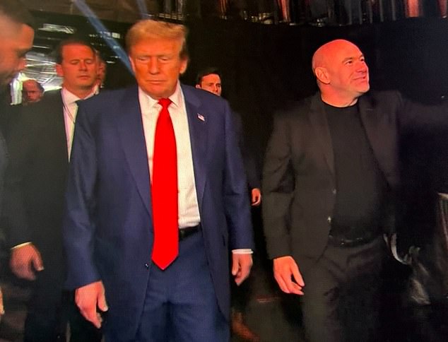 Trump (left) visits the Prudential Center with UFC CEO Dana White (right) on Saturday.