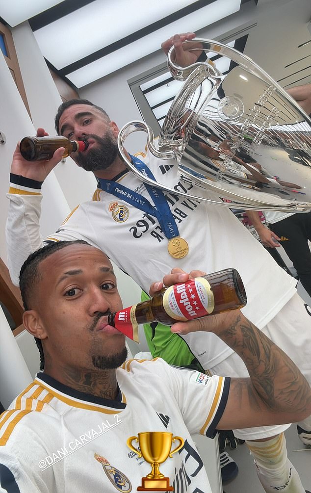 Eder Militao (left) and Dani Carvajal (right) were seen celebrating the win with beer