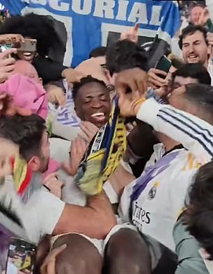 The Brazilian, a favourite among Madrid supporters, was all smiles as he posed among a crowd of fans after the match