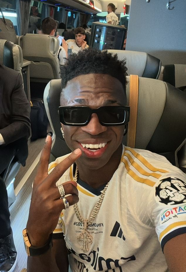 Vinicius Junior (pictured) was one of several players who shared photos of themselves celebrating on the team bus