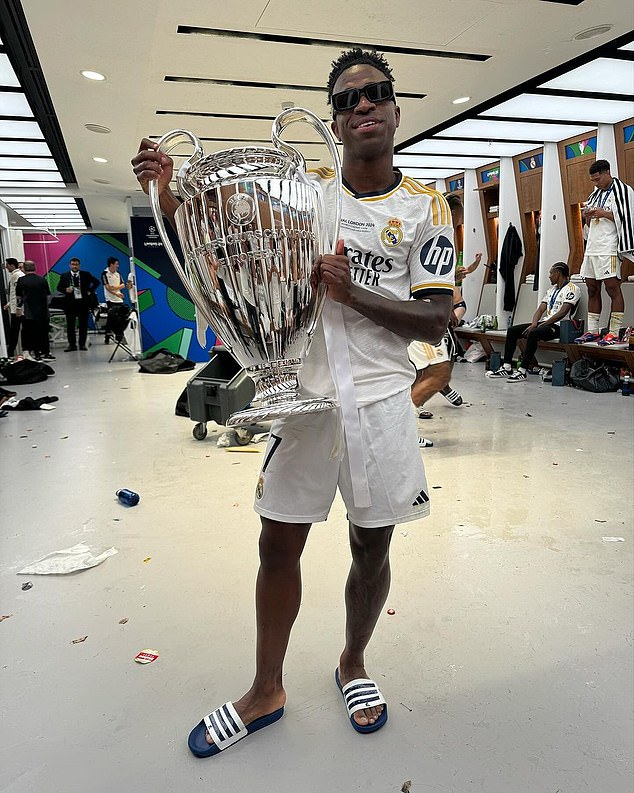 Inside Real Madrid’s title celebrations as Jude Bellingham boogies on the team bus, Jay Z poses for pictures… and Vinicius Jnr is swamped by fans