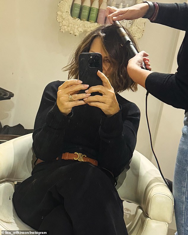 In the frame, Lisa is seen taking a cheeky selfie at a salon while a stylist with 'magic hands' expertly curls her newly cut, shaggy hair which is now shoulder-length. Lisa's comments leave no doubt that the veteran television star is extremely happy with the results