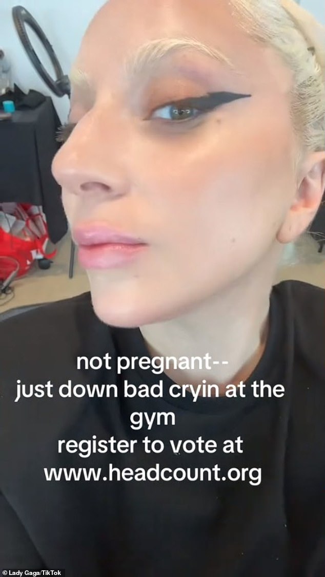 Gaga wrote in the caption, 'Not pregnant - just crying at the gym', partially quoting lyrics from pop rival Taylor Swift's song Down Bad. She then encouraged her 9.3 million followers to 'register to vote'