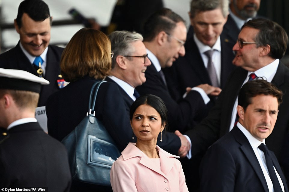Akshata Murty, wife of Prime Minister Rishi Sunak, next to Sir Keir Starmer and Johnny Mercer at today's D-Day commemorations