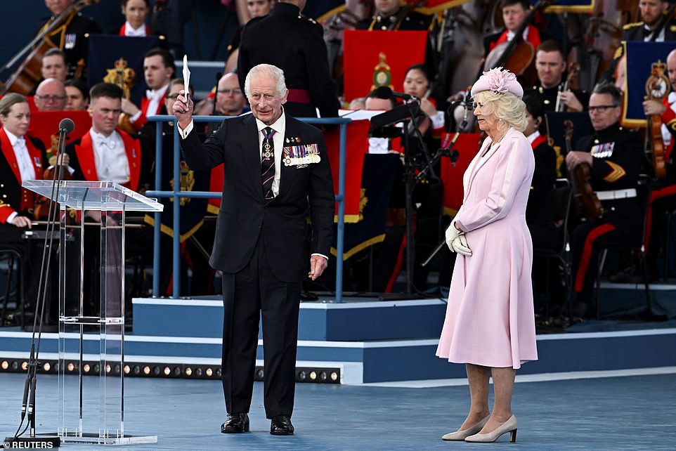 The King, who was giving his first public speech since being diagnosed with cancer, received a standing ovation