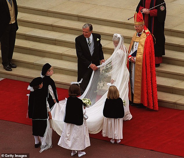 The bride arrived at St George's Chapel in Windsor with her father, Christopher Rhys-Jones.