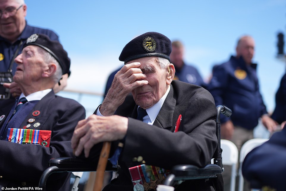 John Dennett, 99, from Liverpool, gets emotional during a Spirit of Normandy Trust wreath-laying service just off the French coastline