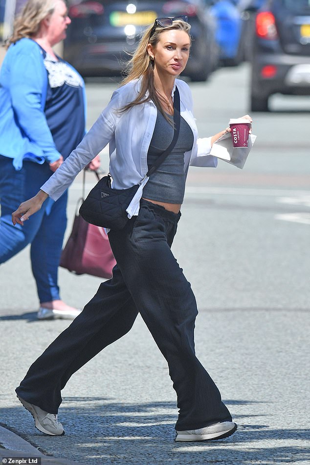 Pregnant Zara Charles displays her baby bump as she makes a rare appearance without boyfriend Ryan Giggs in Cheshire
