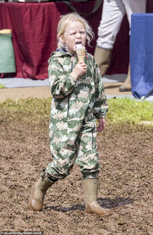 Lena enjoys ice cream while visiting the Fun Fair at the Magic Millions Festival of British Eventing at Gatcombe in 2023