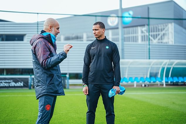 The Boston Celtics coach (right) met Pep Guardiola (left) at City's training base in February