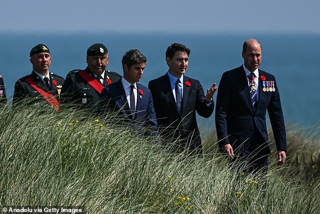 Prince William walking with Canadian Prime Minister Justin Trudeau (centre) and French Prime Minister Gabriel Attal (left) on Juno Beach