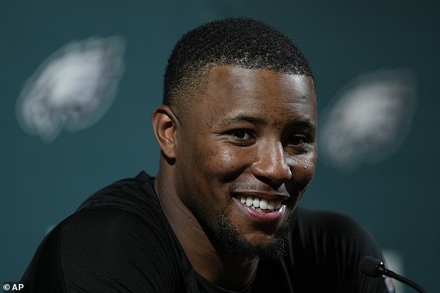 Philadelphia Eagles star’s father ‘is caught with a loaded gun’ during traffic stop in New York City