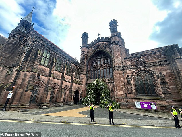 Police deployed outside Chester Cathedral ahead of the wedding this afternoon