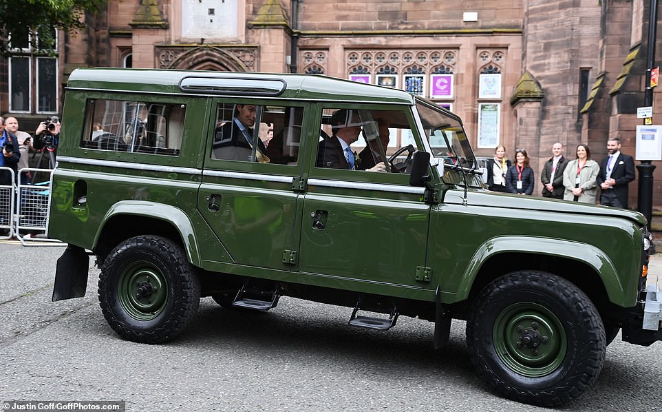 A vehicle pulls up outside the cathedral ahead of the ceremony