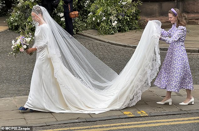 Olivia Hanson arrives at Chester Cathedral for her wedding to the Duke of Westminster