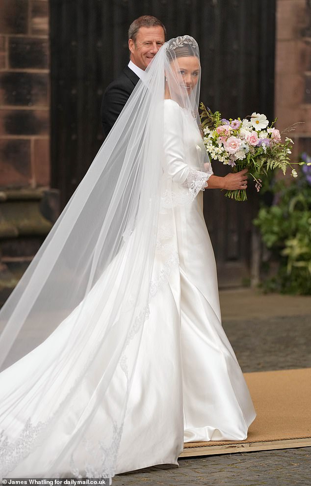 The soon-to-be Duchess, 31, wowed the crowds - gathered in their hundreds - as her father, Rupert Henson, joined her as she walked towards her wedding