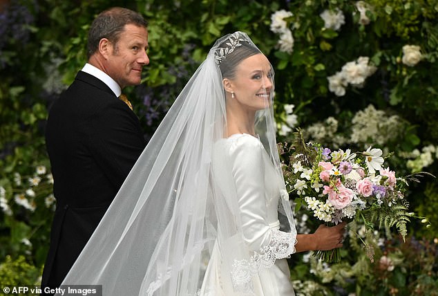 Olivia looked gorgeous as she arrived for her wedding to the Duke of Westminster today