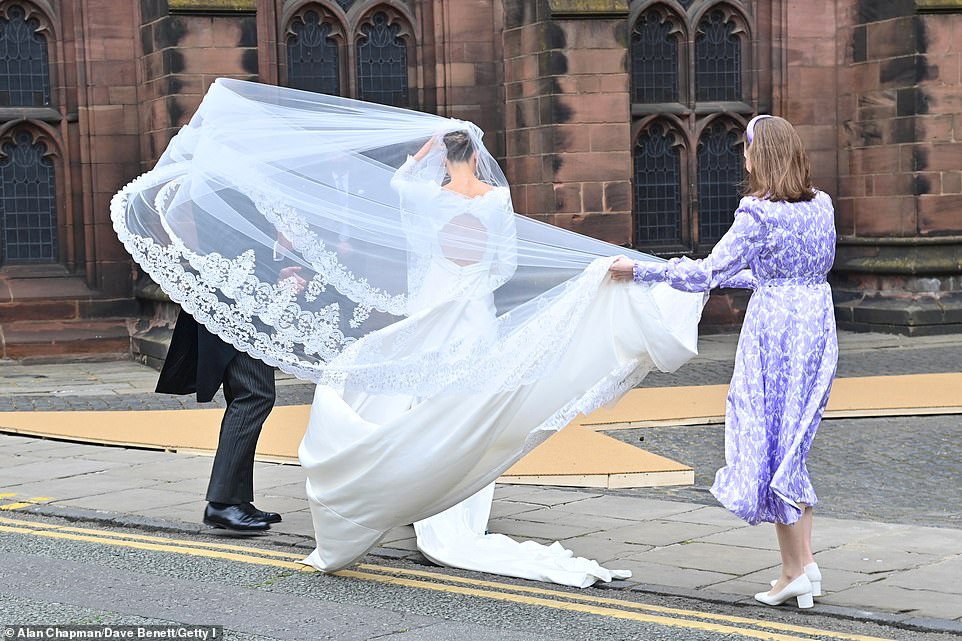 Olivia Henson arrives at her wedding to Hugh Grosvenor, 7th Duke of Westminster