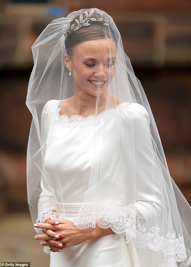 Adding even more glitz to her outfit, the Duchess sported a pair of dazzling pearl drop earrings