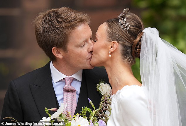 The Duke and Duchess seal their marriage with a sweet kiss after their wedding ceremony