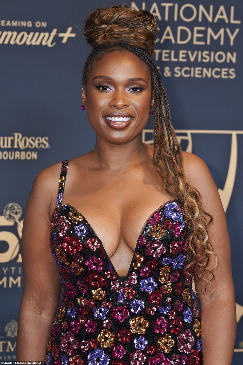 Jennifer held a big smile on her face as she paused for a quick photo session on the red carpet upon arriving to the venue on Friday