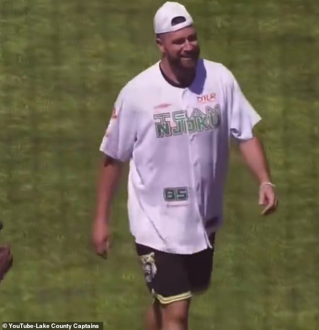Travis Kelce joins NFL stars in local celebrity softball game in hometown, Cleveland, as girlfriend Taylor Swift performs Eras Tour in Scotland