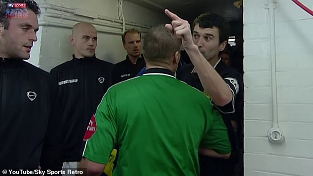 Keane was furious and pointed his finger at Vieira while referee Graham Poll tried to calm him down