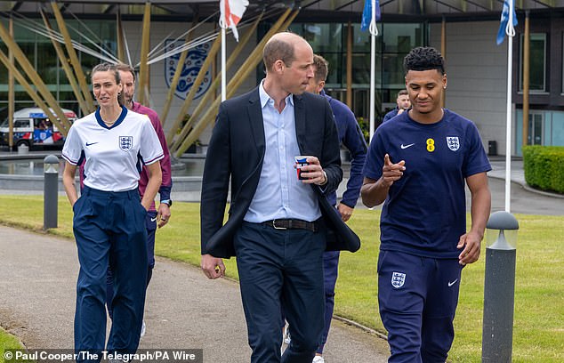 The Prince of Wales speaks with England's Ollie Watkins at St George's Park today