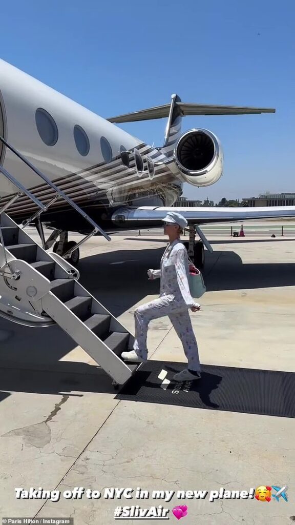 Paris Hilton shows off her ‘new plane’ as she boards a private jet in her pajamas and slippers before flying to New York: ‘SlivAir’