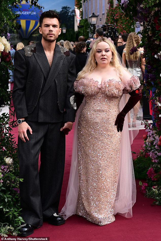 Nicola Coughlan steals the show in sequinned pink gown as she holds hands with her dapper onscreen lover Luke Newton at Bridgerton’s Season Three Part II premiere in London
