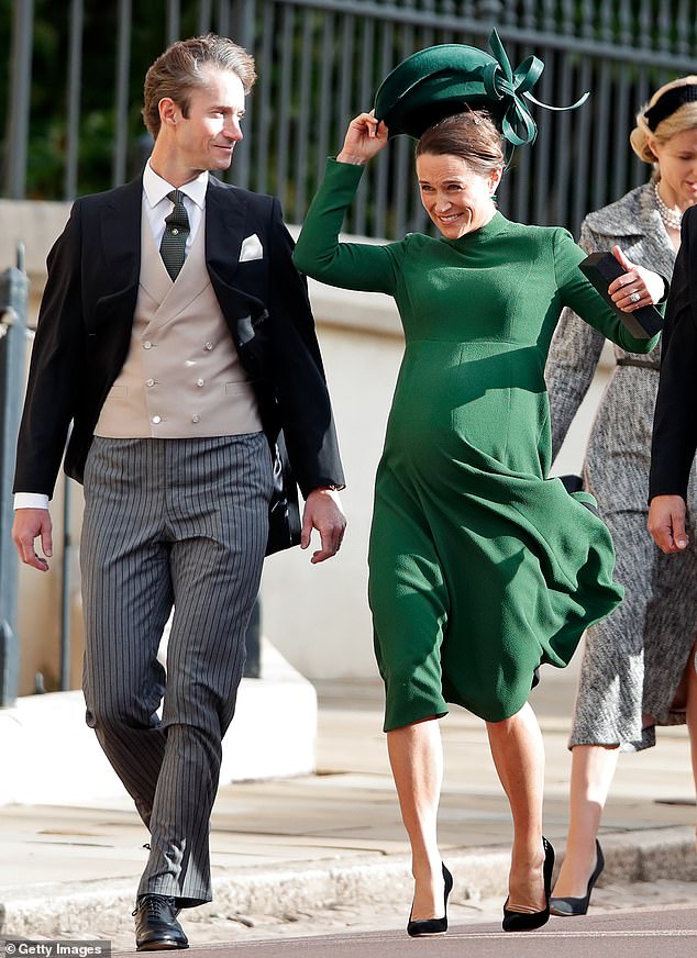 Pregnant Pippa Middleton managed to catch her hat in time