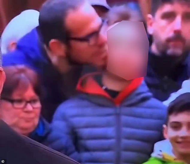 Revealed: Grinning man who nibbled on boy’s ear in viral World Championship Snooker video is identified – and defends his actions