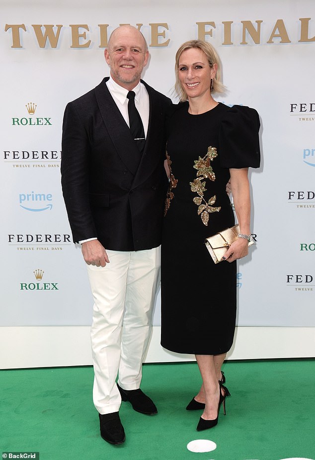 Zara and Mike Tindall refuse to let the rainy weather dampen their spirits as they attend Federer: Twelve Final Days screening in London
