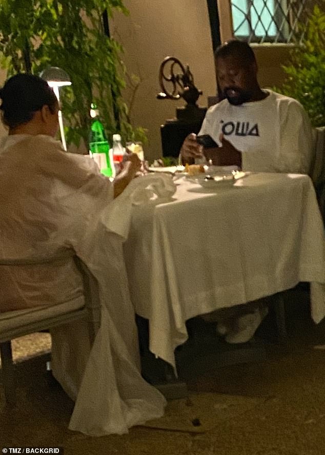 Meanwhile, West sported a casual, covered-up outfit and paired a white, long-sleeved top with pants and sneakers