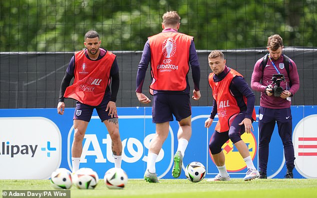 Kyle Walker (left) and Kieran Trippier (right) take part in a defensive training exercise