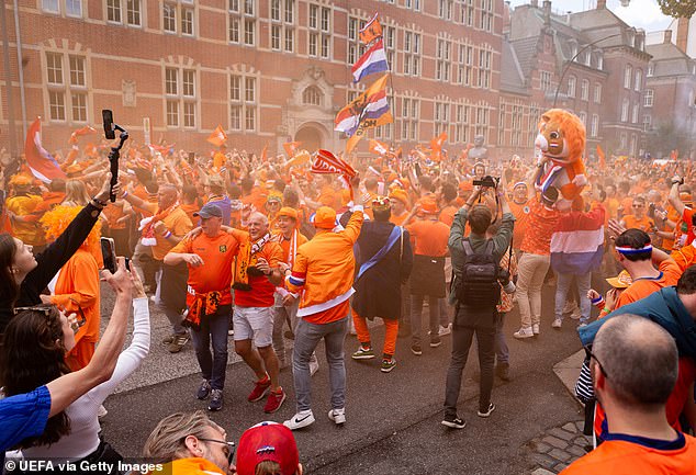 Netherlands fans are pictured during a Fan Walk at the official UEFA Fan Zone