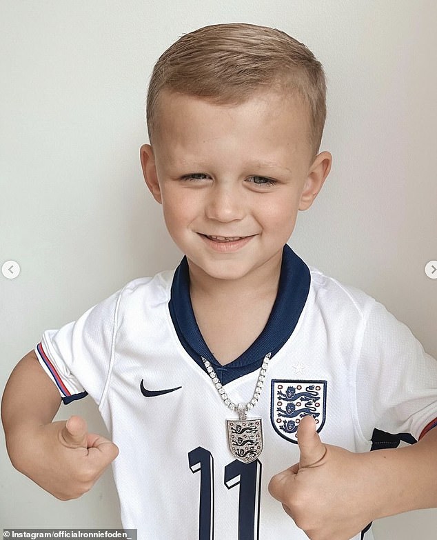Ronnie, five, is known for his cheeky personality after he was spotted trying to open a bottle of champagne after Manchester City won an unprecedented fourth Premier League title in May.