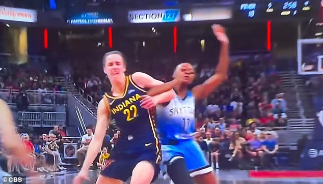 The reverse angle clearly shows Clarke was fouled as she initially dribbled towards the hoop