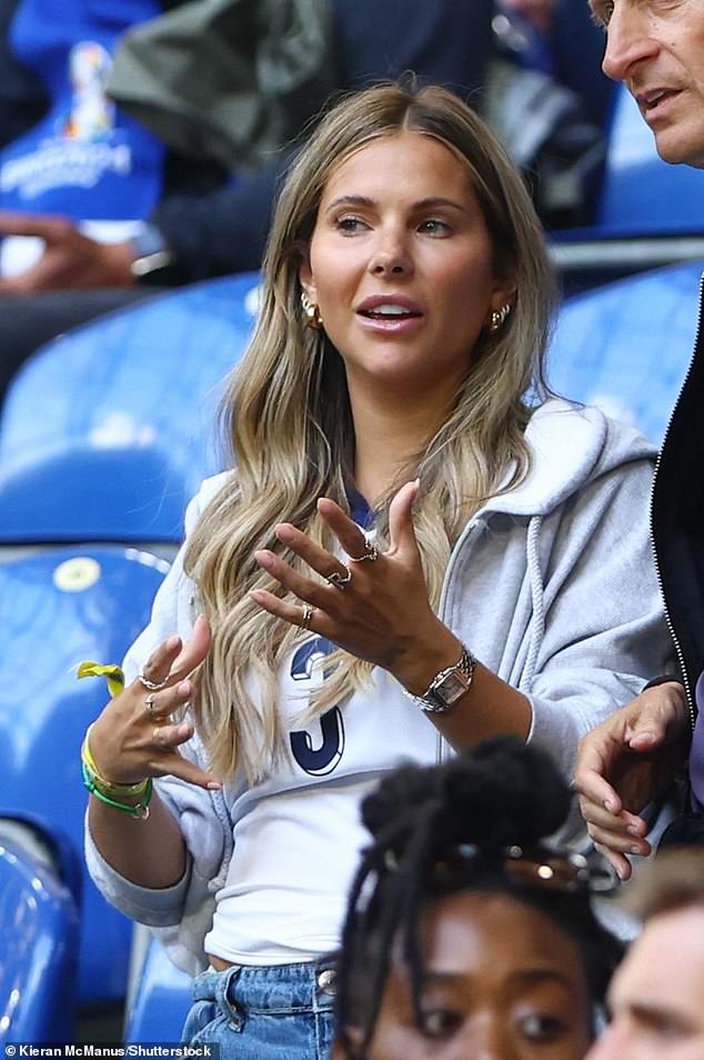 Luke Shaw's partner Anushka Santos was seen busy in deep conversation while waiting for the game to start