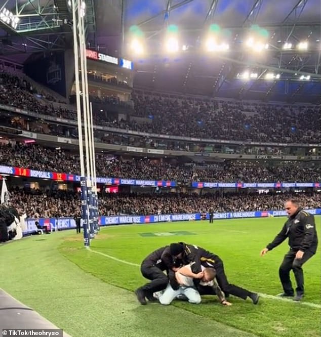 Brayden Maynard’s pitch invader mate is handed a LIFETIME ban from AFL footy after storming the field during epic Collingwood win